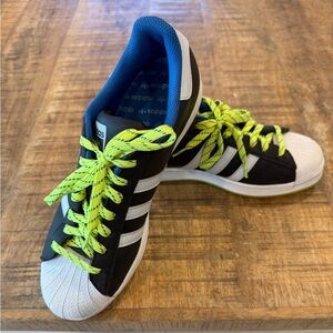 Adidas Black and White Sneakers with Neon Yellow Laces